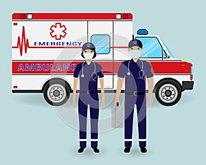 Hospital staff concept. Paramedics ambulance team in medical protection masks with ambulance car. Emergency serviice