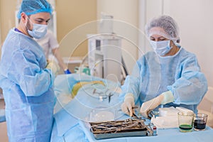 Hospital. Surgeon operates in the operating room. Surgeon getting ready to operate on a patient