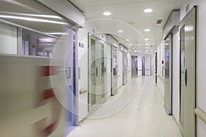 Hospital surgery corridor with rooms. Nobody