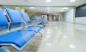 Hospital waiting room with empty chairs