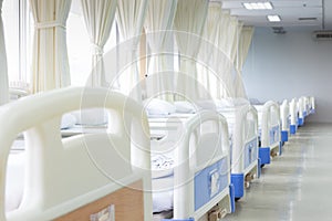 Hospital ward with beds and medical equipment