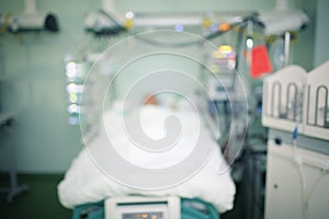 Hospital ward with dying patient, unfocused background