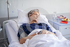 Hospitalized senior woman sleeping at hospital