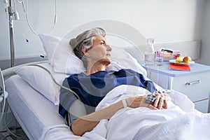 Hospitalized senior woman thinking