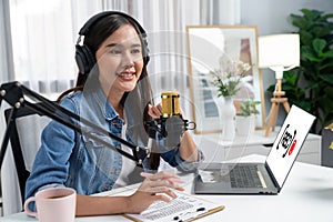 Host channel of beautiful Asian broadcaster talking in online. Stratagem.