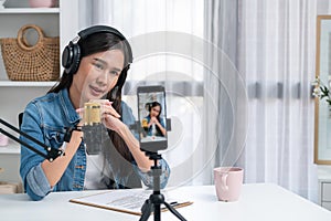 Host channel talking in broadcast wearing headset smartphone record. Stratagem.