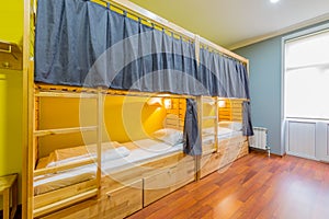 The hostel dormitory beds arranged in room
