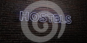 HOSTELS -Realistic Neon Sign on Brick Wall background - 3D rendered royalty free stock image