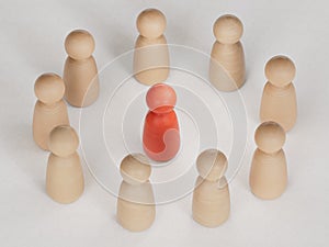 Hostile work environment. A Circle of Wooden figures. Harassment.3D rendering on white background.