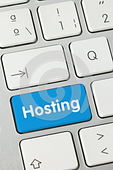 Hosting - Inscription on Blue Keyboard Key