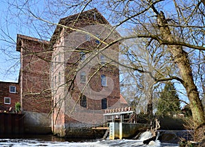 Hostorical Water Mill in Spring at the River Boehme in the Town Walsrode, Lower Saxony