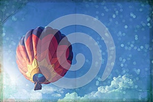 Hot air ballon paper texture, blue sky and light effect, vintage