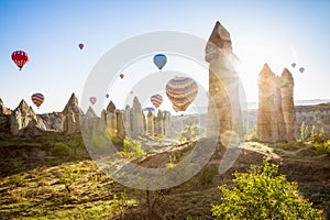 Hot air ballons over Love Valley near Goreme and Nevsehir in the center of Cappadocia, Turkey region of Anatolia.