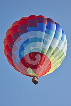 Hot air balloon, colorful aerostat in a sunny day
