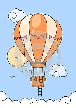 Hot air balloon fly on the blue sky.