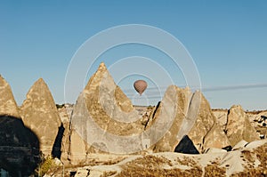 Hot air balloon flying in Goreme national park, fairy chimneys,