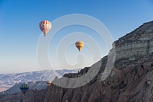 Hot air balloon flying over Cappadocia