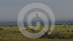 Hot air balloon flying in sky at Murchison Falls National Park, Uganda.