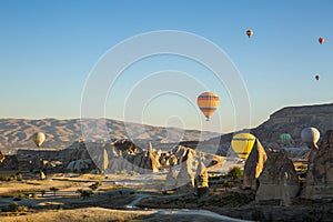 Hot air balloon flying at sunrise