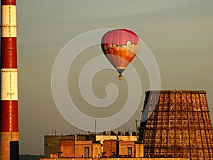 Hot-air balloon over the factory