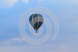 Hot air balloon over Serengeti National Park in Tanzania at sunrise