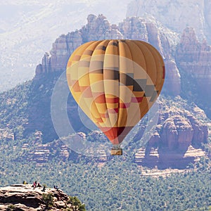 A Hot Air Balloon Soars Near Sedona, Arizona photo