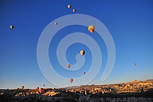 Hot air balloon at sunrise at GÃ¶reme National Park (UNESCO)