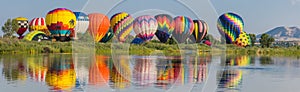 Hot Air Balloons Along River Panorama