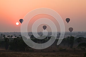 Hot air balloons in Bagan at sunrise