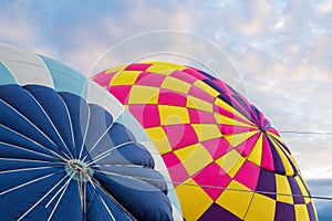 Hot air balloons being inflated at the International Balloon Fiesta in Albuquerque, New Mexico