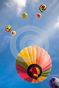 Hot-air balloons with blue sky and clouds background