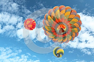 Hot-air balloons with blue sky and clouds background