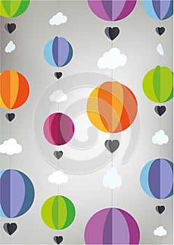 Hot air balloons cut from paper with clouds and hearts