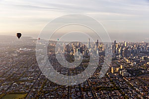 Hot Air Balloons Dotted Perfectly In A Line Of 3 Looking At Melbourne CBD