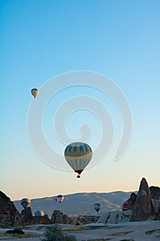 Hot air balloons and fairy chimneys in Cappadocia Turkey