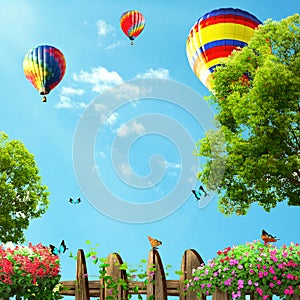 Hot air balloons high in the blue sky, view from house garden