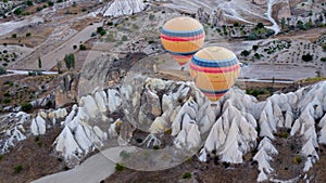 Hot air balloons hovering over the volcanic  valley . Living- Museum, Cappadocia,Turkey, autumn