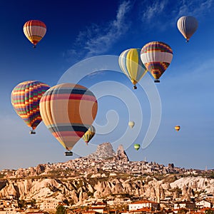 Hot air balloons near Uchisar castle