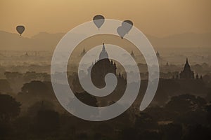 Hot air balloons over Bagan plain at sunrise, Myanmar, Burma