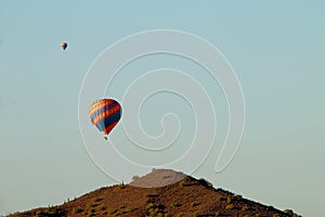 Hot Air Balloons over Desert Mountain