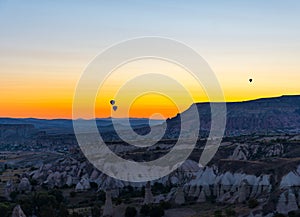 Hot Air Balloons Over Love Valley in Cappadocia, Turkey at Dawn