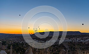 Hot Air Balloons Over Love Valley in Cappadocia, Turkey at Dawn