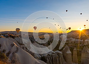 Hot Air Balloons Over Love Valley in Cappadocia, Turkey at Dawn