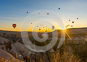 Hot Air Balloons Over Love Valley in Cappadocia, Turkey at Dawn