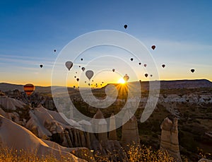 Hot Air Balloons Over Love Valley in Cappadocia, Turkey at Dawn