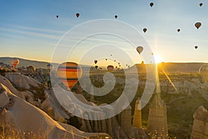 Hot Air Balloons Over Love Valley in Cappadocia, Turkey at Dawn