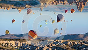 Hot air balloons soar in fantastical realm where parallel worlds collide photo