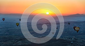 Hot air balloons at sunrise in cappadoccia