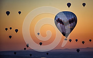 Hot air balloons at sunrise in cappadoccia