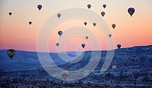 Hot air balloons at sunrise in cappadoccia